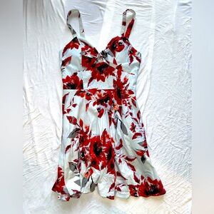 Light blue with red florals dress.